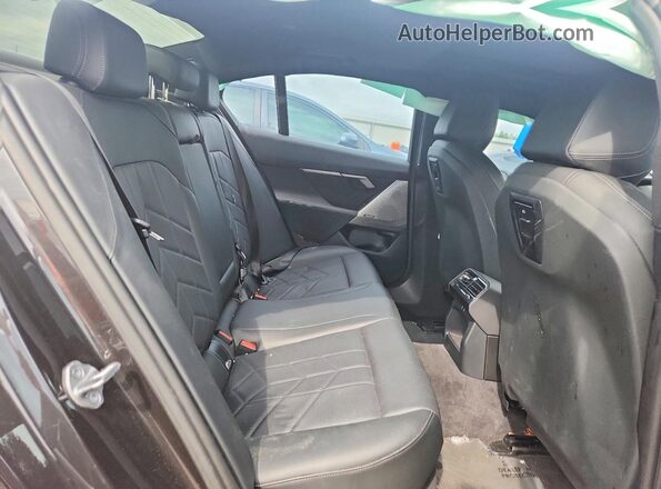 WBA43FJ09RCS35810 2024 BMW 5 SERIES Charcoal უკანა სავარძლების ხედი