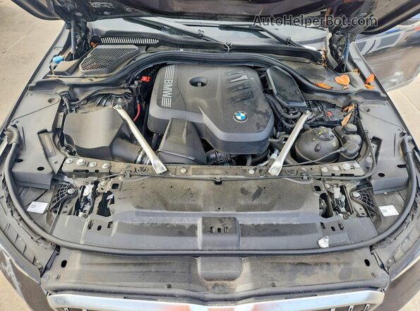 WBA43FJ09RCS35810 2024 BMW 5 SERIES Charcoal უკანა სალონის ხედი