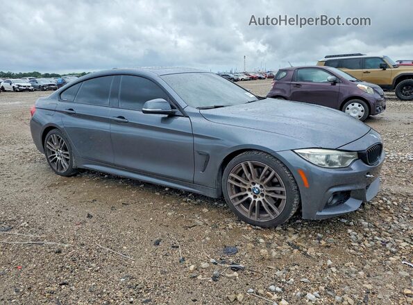 WBA4A9C52GG505868 2016 BMW 4 SERIES Gray Front right