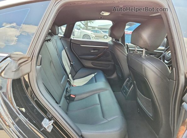 WBA4A9C58GG505261 2016 BMW 4 SERIES Black Vista de los asientos traseros