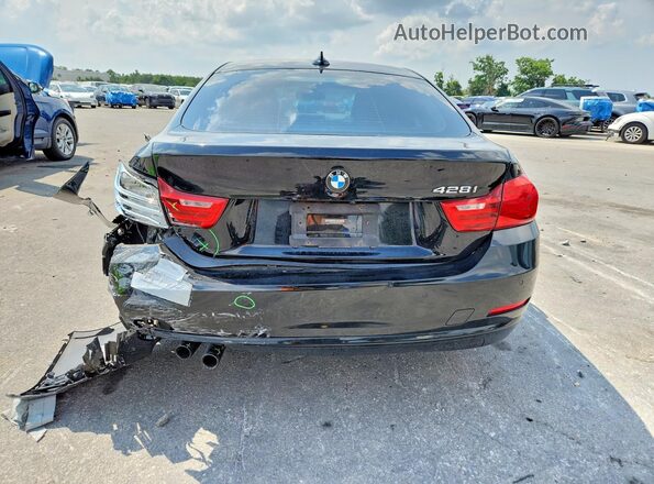 WBA4A9C58GG505261 2016 BMW 4 SERIES Black Vista trasera