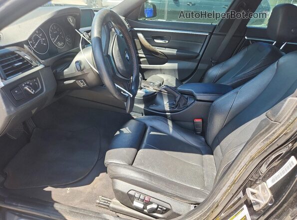 WBA4C9C58GG136203 2016 BMW 4 SERIES Черный Вид салона спереди