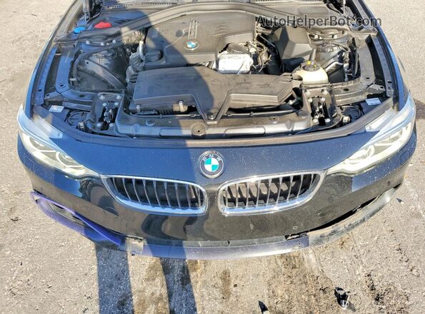 WBA4C9C59GG141572 2016 BMW 4 SERIES Black უკანა სალონის ხედი