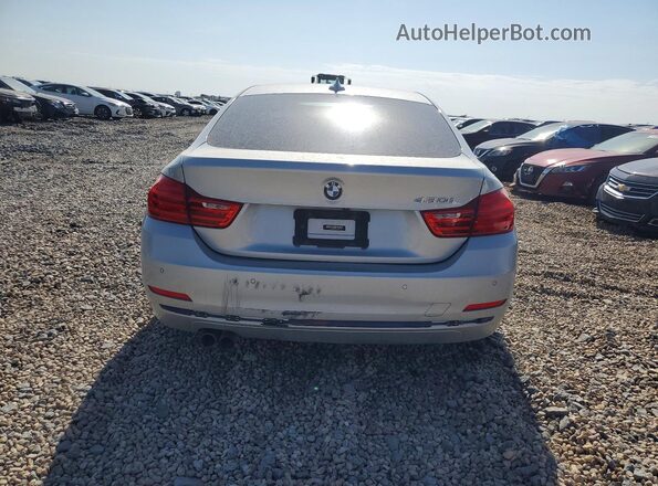 WBA4F7C57HG787240 2017 BMW 4 SERIES Silver Rear view