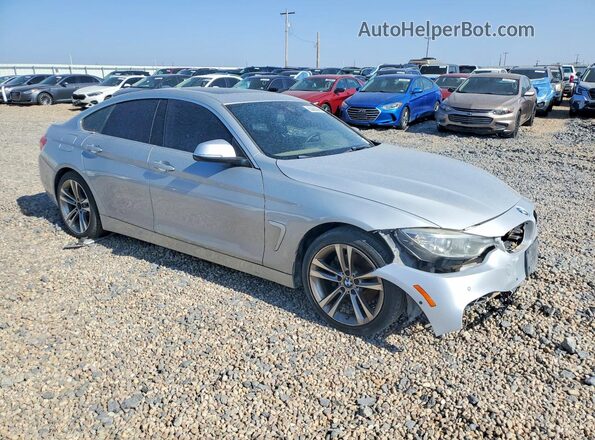 WBA4F7C57HG787240 2017 BMW 4 SERIES Silver Front right