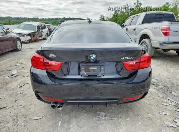 WBA4F7C58HG437728 2017 BMW 4 SERIES Black Rear view