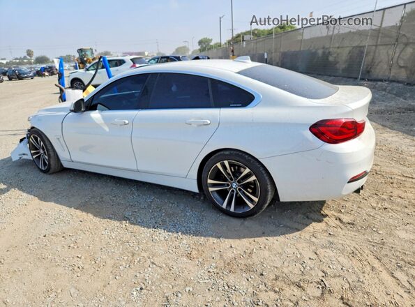 WBA4J1C05LBU67517 2020 BMW 4 SERIES White Rear left