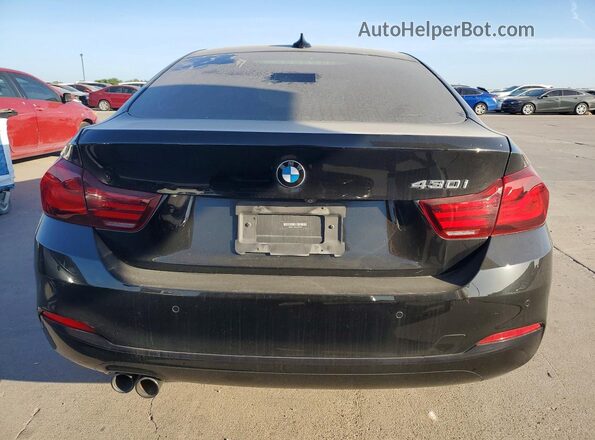 WBA4J1C09LCD99395 2020 BMW 4 SERIES Black წინა სალონის ხედი