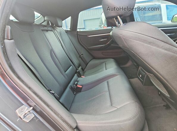 WBA4J1C52JBG79464 2018 BMW 4 SERIES Gray Widok tylnych siedzeń