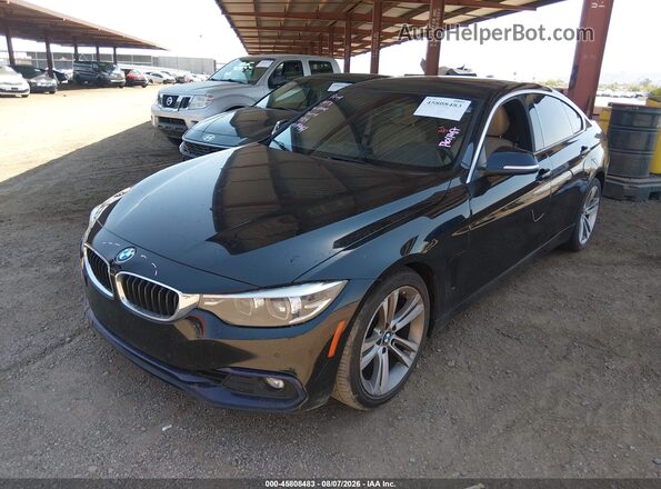 WBA4J1C52KBM13134 2019 BMW 4 SERIES Black Front left