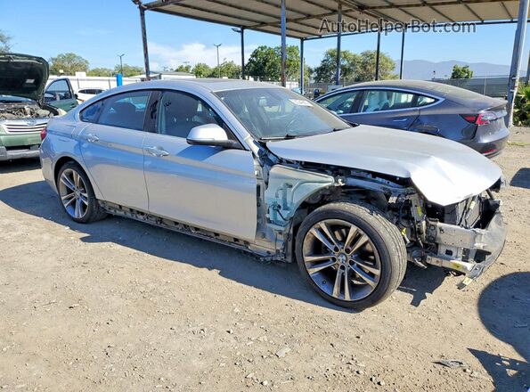 WBA4J1C52KBM13392 2019 BMW 4 SERIES Silver Front right