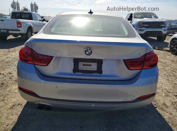 WBA4J1C52KBM13392 2019 BMW 4 SERIES Silver Rear view