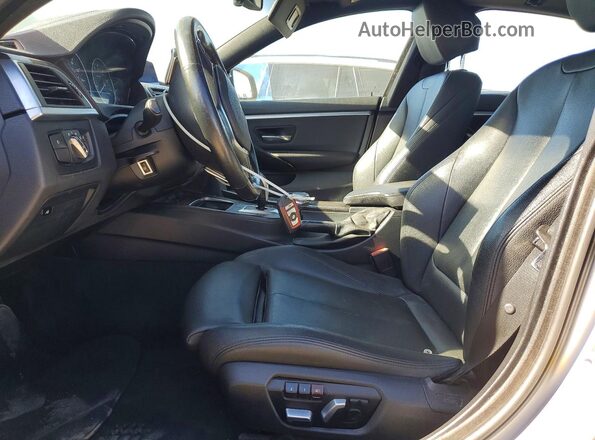 WBA4J1C52KBM13392 2019 BMW 4 SERIES Silver Front interior view