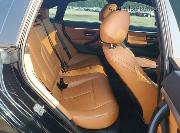 WBA4J1C56KBM18143 2019 BMW 4 SERIES Black Rear seats view