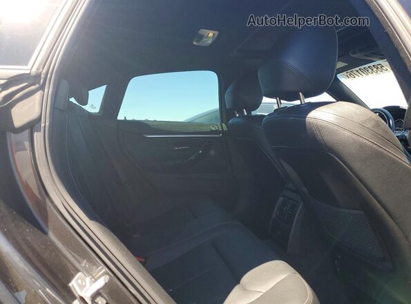 WBA4J5C59JBF06337 2018 BMW 4 SERIES Charcoal Вид задніх сидінь