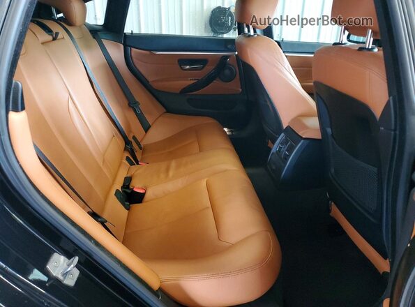WBA4J7C50KBM76350 2019 BMW 4 SERIES Black Vista de los asientos traseros