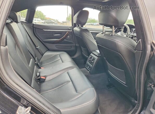 WBA4J7C54JBB98666 2018 BMW 4 SERIES Black Rear seats view