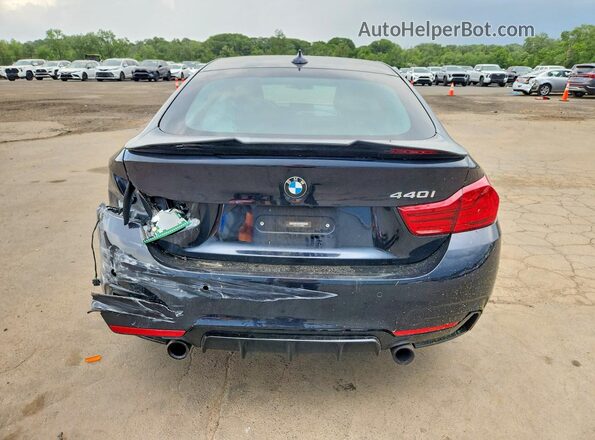 WBA4J7C54JBB98666 2018 BMW 4 SERIES Black Rear view