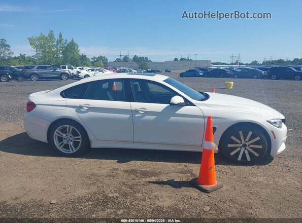 WBA4J7C55JBH15490 2018 BMW 4 SERIES White Rear interior view
