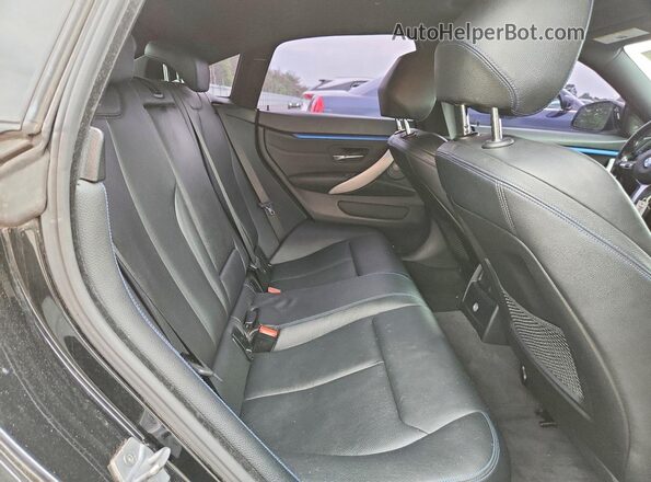 WBA4J7C59KBM75486 2019 BMW 4 SERIES Black Вид задніх сидінь