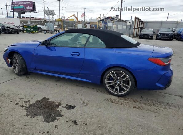 WBA53AT08RCN05310 2024 BMW M4 Blue Trasero izquierdo