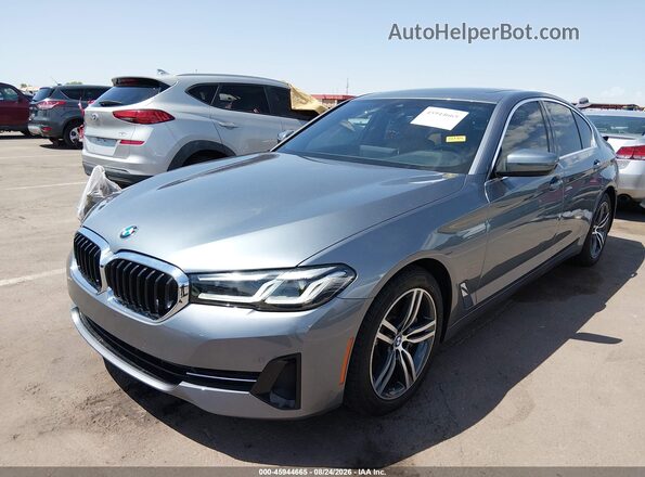 WBA53BH07MCF72975 2021 BMW 5 SERIES Gray Vista tres cuartos delantera izquierda