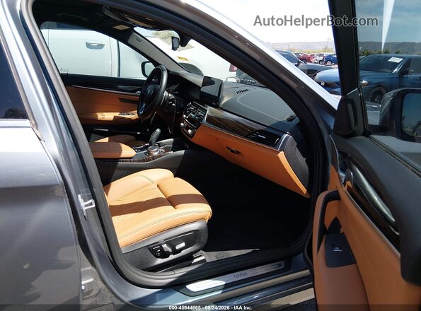 WBA53BH07MCF72975 2021 BMW 5 SERIES Gray Vista interior delantera