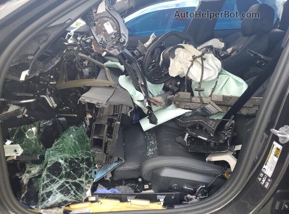 WBA53FJ04VCY26013 2027 BMW 5 SERIES Gray Vista interior delantera