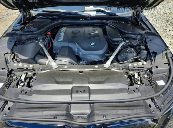 WBA53FJ09RCT07531 2024 BMW 5 SERIES Black Սալոնի հետևի տեսք