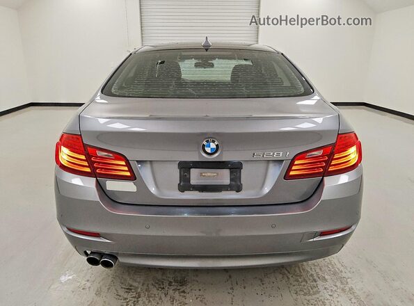 WBA5A5C51GG349724 2016 BMW 5 SERIES Gray Вид ззаду