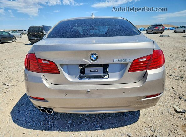 WBA5A5C53GD526601 2016 BMW 5 SERIES Золотой Вид сзади