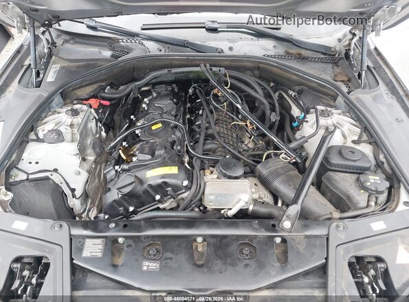 WBA5B3C55GG255637 2016 BMW 5 SERIES Gray Vista trasera
