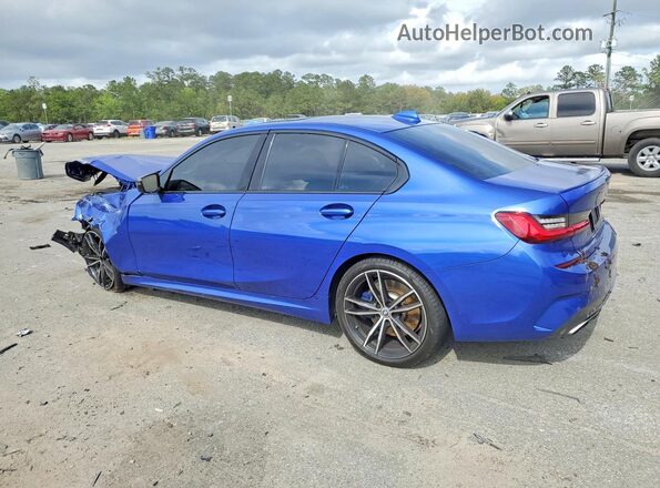 WBA5U7C02LFH56395 2020 BMW M3 Blue Rear left