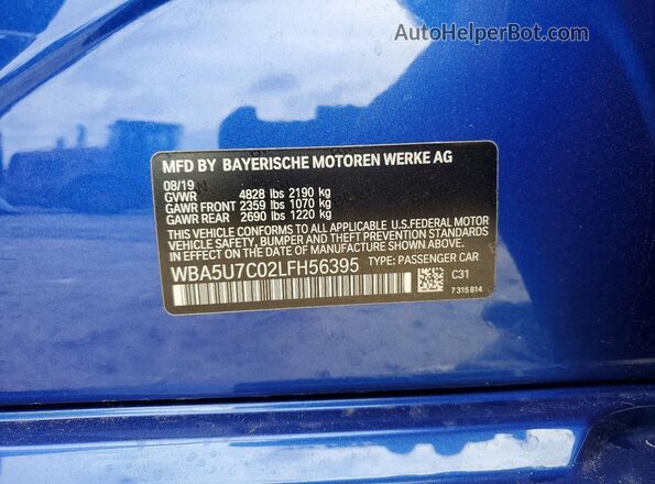 WBA5U7C02LFH56395 2020 BMW M3 Blue Engine compartment view
