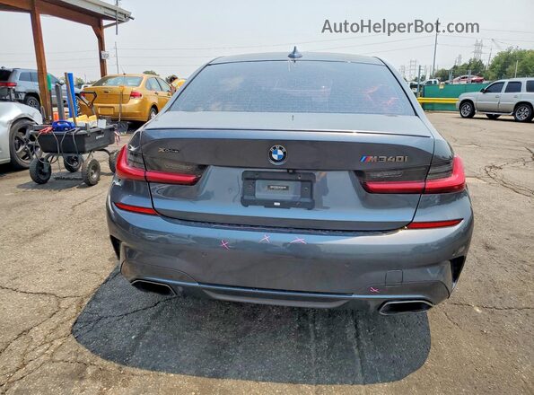 WBA5U9C07LAF54712 2020 BMW M3 Gray Widok z tyłu