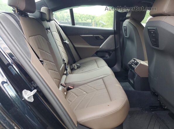 WBA63FJ06SCU89019 2025 BMW 5 SERIES Black Հետևի նստատեղերի տեսք