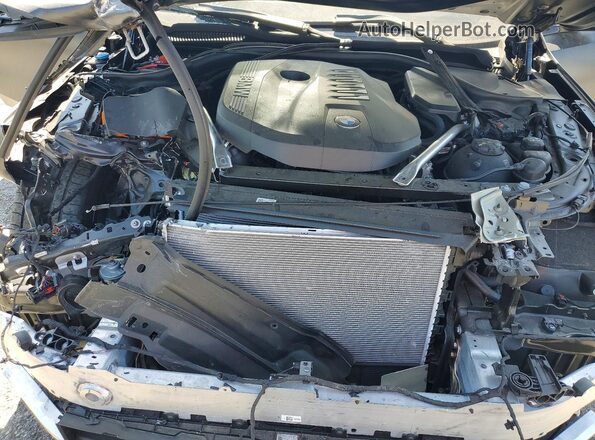 WBA63FJ07TCV92046 2026 BMW 5 SERIES Black უკანა სალონის ხედი