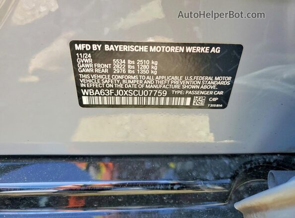 WBA63FJ0XSCU07759 2025 BMW 5 SERIES Gray Engine compartment view