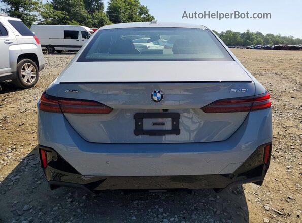WBA63FJ0XSCU07759 2025 BMW 5 SERIES Gray Rear view