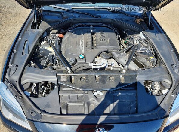 WBA6F1C56JGT83874 2018 BMW 6 SERIES Черный Вид задней части салона