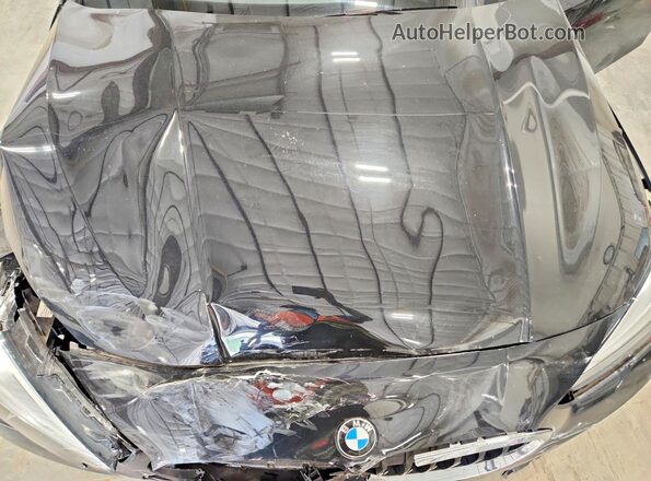 WBA73AK00M7J40634 2021 BMW 2 SERIES Black Vista interior trasera