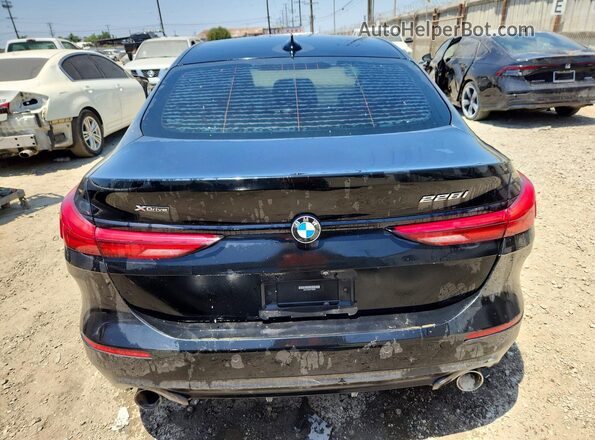 WBA73AK04L7F68093 2020 BMW 2 SERIES Black Rear view
