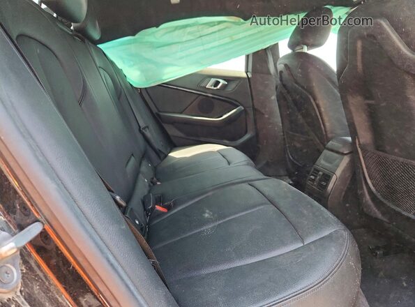 WBA73AK04L7F68093 2020 BMW 2 SERIES Black Rear seats view