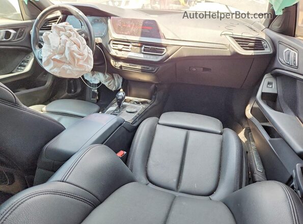 WBA73AK04L7F68093 2020 BMW 2 SERIES Black Dashboard view
