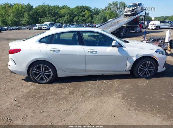 WBA73AK07L7F84322 2020 BMW 2 SERIES White Widok wnętrza z tyłu