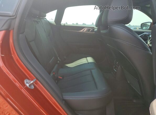 WBA73AV00PFN22880 2023 BMW 4 SERIES Orange Vista de los asientos traseros