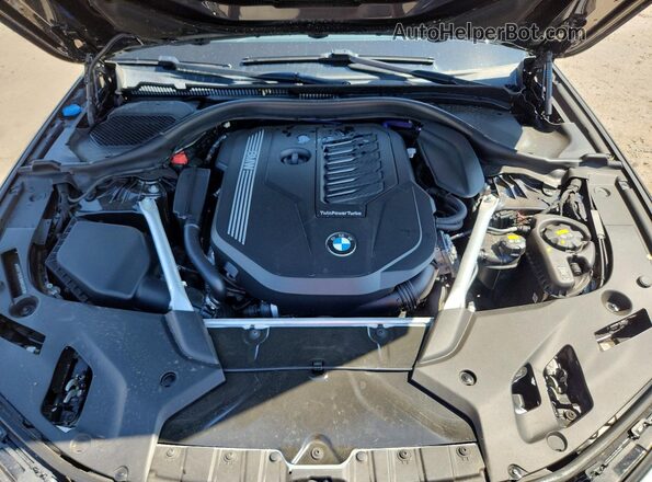 WBA73BJ03NWX52812 2022 BMW 5 SERIES Black უკანა სალონის ხედი