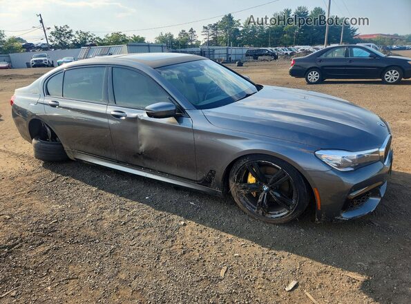 WBA7E2C58HG740107 2017 BMW 7 SERIES Gray Front right