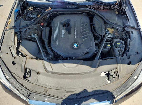 WBA7E4C50HGU99459 2017 BMW 7 SERIES Charcoal უკანა სალონის ხედი