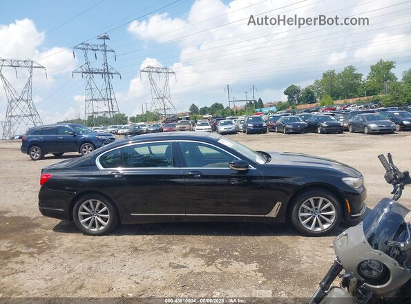 WBA7E4C56KGV28373 2019 BMW 7 SERIES Black Вид задньої частини салону